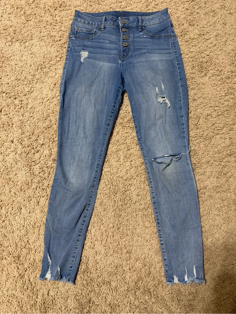 Woman’s skinny jeans distressed